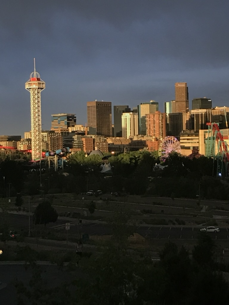 The Denver skyline at dusk from City Park