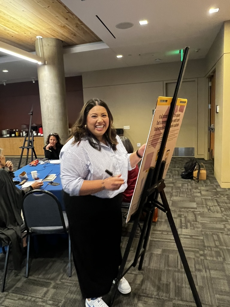 A facilitator leading a cohort working session